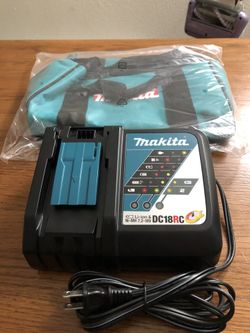 Makita DC18RC Li-ion Fast charger and new Makita bag.