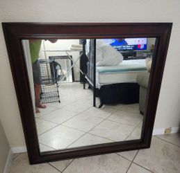 Hanging wall mirror 48 in by 48 in with a 4-in Wood Frame  Only $37.50 - Firm