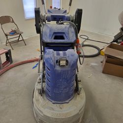 Concrete grinder