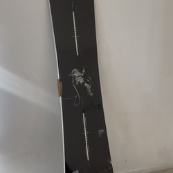 Burton Snowboard with new boots and binding