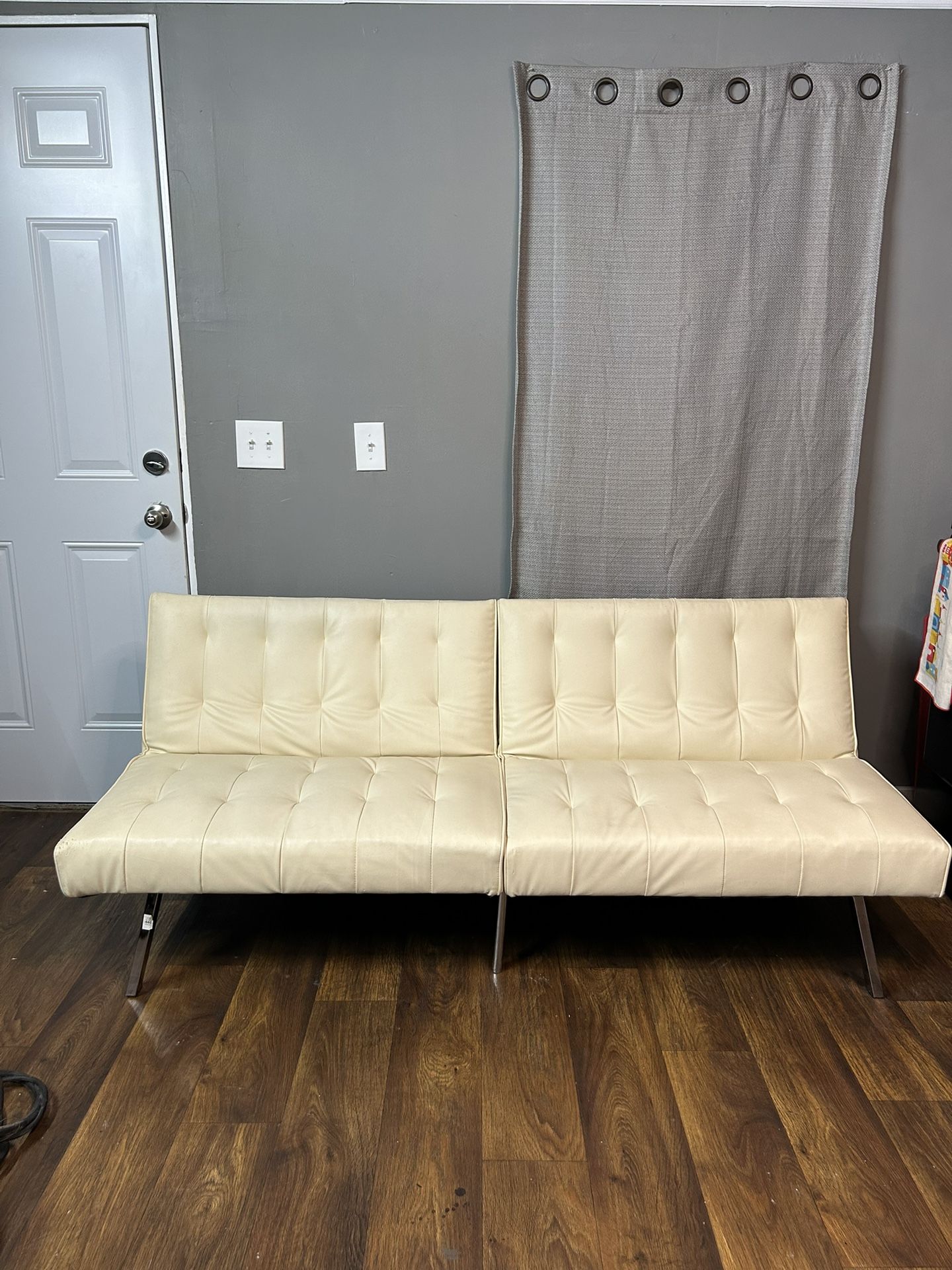 Cream Faux Leather Futon
