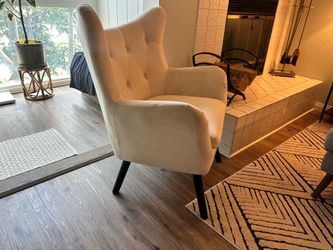 Off white colored chair