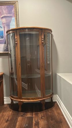 ANTIQUE ROUNDED GLASS CURIO CABINET