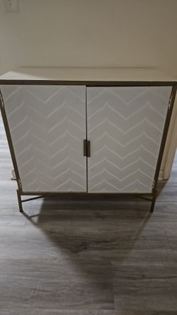 Two-Door Cabinet with Gold Metal Frame