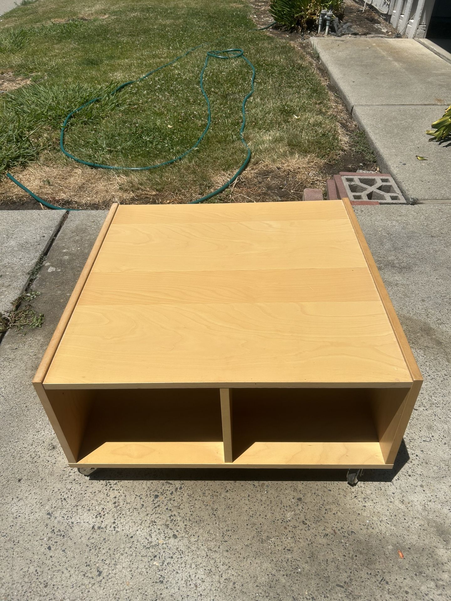 Rolling Coffee Table With Glass Cover And Storage Interior
