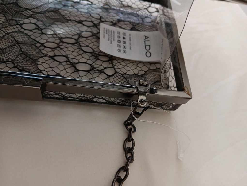 ALDO
Clutch Bag.