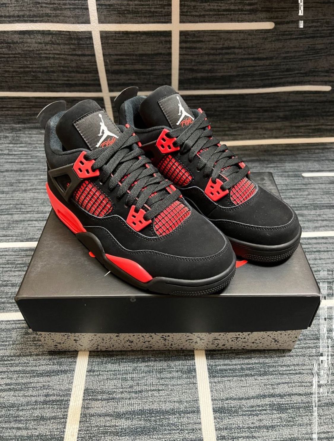 Jordan 4 Retro “Red Thunder”