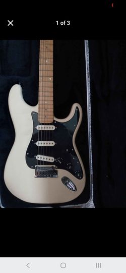 Fender Lite Ash Stratocaster with Birdseye C Maple next in hardshell heavy duty flight case