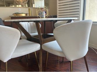 Round 45 inch dining table and four matching chairs