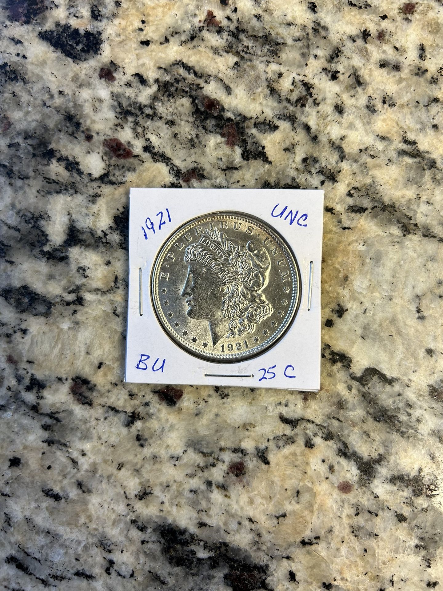 1921 UNCIRCULATED MORGAN SILVER DOLLAR. (25c)