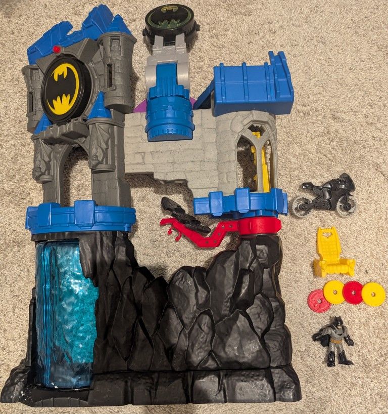 Fisher-Price Imaginext DC Super Friends Batman Toy, Wayne Manor Batcave Playset with Figure & Batcyle (Used)