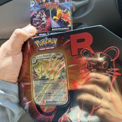 Destin rivals booster bundle and team rocket tin