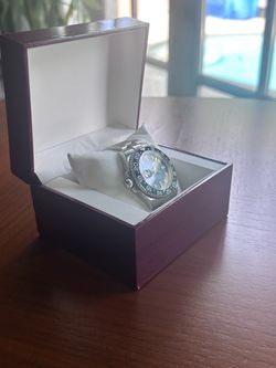 Stainless Steel Watch with Green Bezel