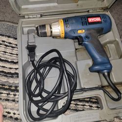 Ryobi drill machine corded with safty case.