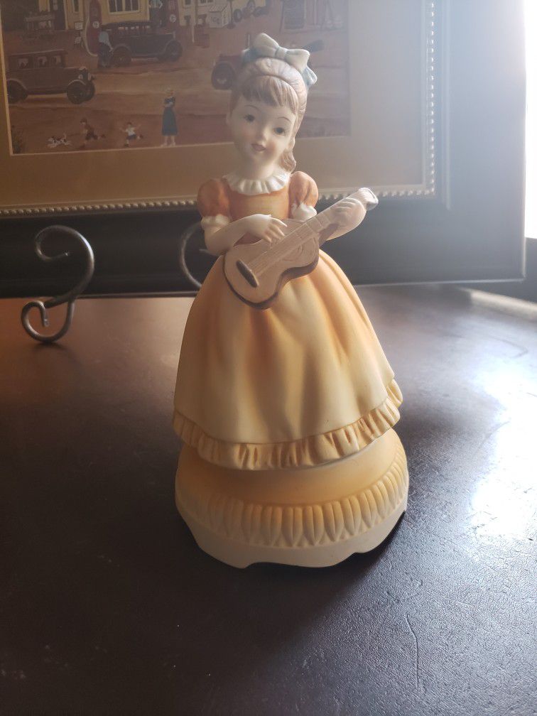 Lefton girl with guitar musical figurine