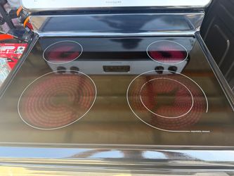 Frigidair Range/Stove 4 Burners 3 months warranty delivery and installation available