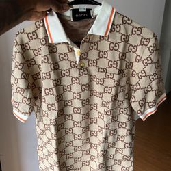 GUCCI SHIRT (UNAUTHENTIC) SIZE SMALL 75$