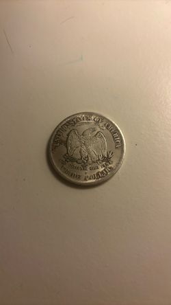 1885 Silver Trade Dollars.