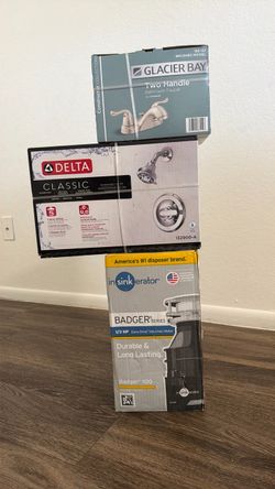 Garbage disposal,  faucet ,shower kit.