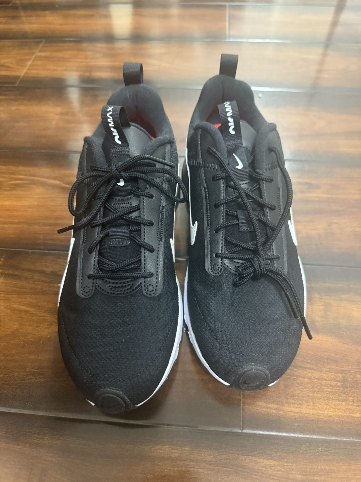 Nike Air Max INTRLK Lite sneakers In A Size 9 Women