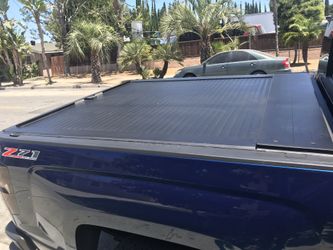 Rolling toner bed cover