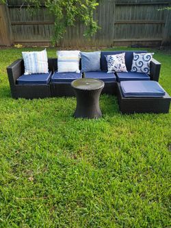 Luxury modular wicker sectional patio set with hidden ice cooler ( delivery available)