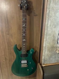 Trade for epiphone 335 or dog ear solid body.
