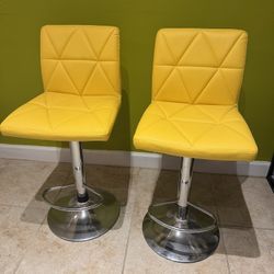 A Set Of Two Bar Stools 