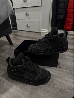 Black Cat Jordan 4s
