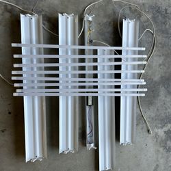 4 Lithonia Double 4ft Fluorescent Light Fixtures With LED Replacement Tubes.