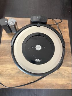 iRobot vacuum and charger dock