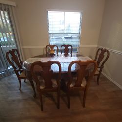Colonial Styled Wooden Table W/ Table Extentions And Chairs