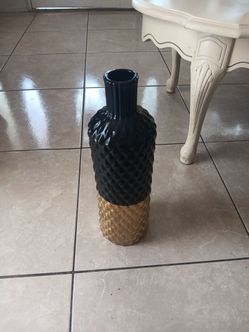 Golden black vase
