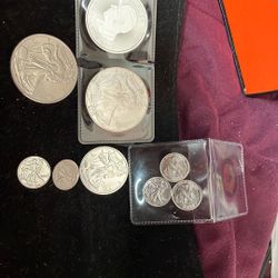 Collection Of Lot Of Silver Canadian Maple  1oz Silver American Eagle 1 Oz Silver American Eagles Round Of 1 Oz 1/2 Oz And 1/10 Of Oz(5)