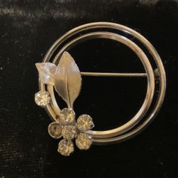 Silver Tone Brooch By KREMENTZ .leaf With Clear Rhinestones 
