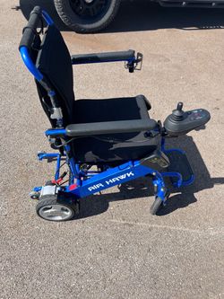 Air Hawk folding power wheelchair, like new, both batteries