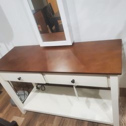 Off-white finish with chestnut top
Two drawers and one shelf for storage(New)