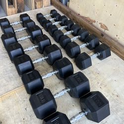 New pair of 10,15,20,25,30,45,50 and 55lb rubber dumbbells NEW IN BOX $500