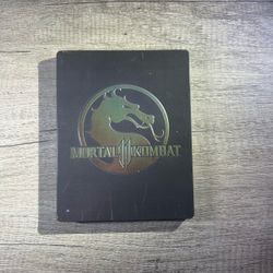 Mortal Kombat 11 SteelBook Edition PS4 game disc