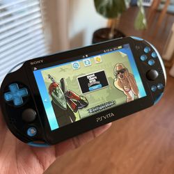 PSVITA SLIM with games and movies