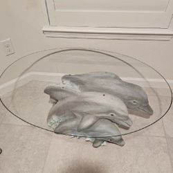 LikeOval Glass Coffee Table with Hand Painted Dolphin Base 
