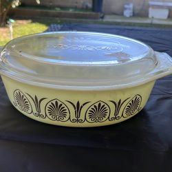 Pyrex Casserole Yellow and gold .