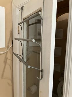 Gray metal three replace tile rack with two hooks 17 inches wide by 24 inches tall Gray metal three replaced tile rack with two hooks 17 inches wide b