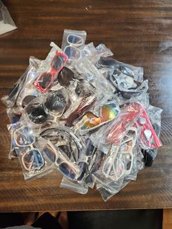 SUN GLASSES LOT OF 115