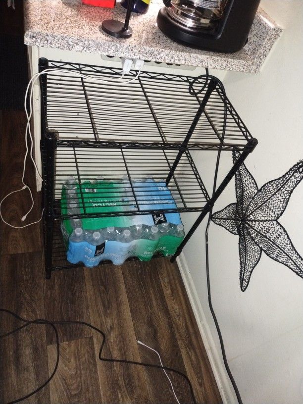 Solid Metal Shelf With Three Shelves 31 In Tall 23 And 1/4 In Wide The 13 And A Half Inches Depth