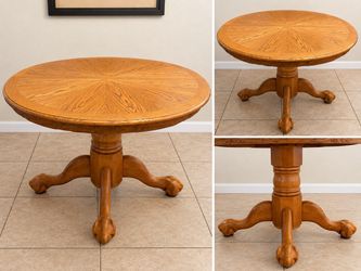Round wooden table with removable top