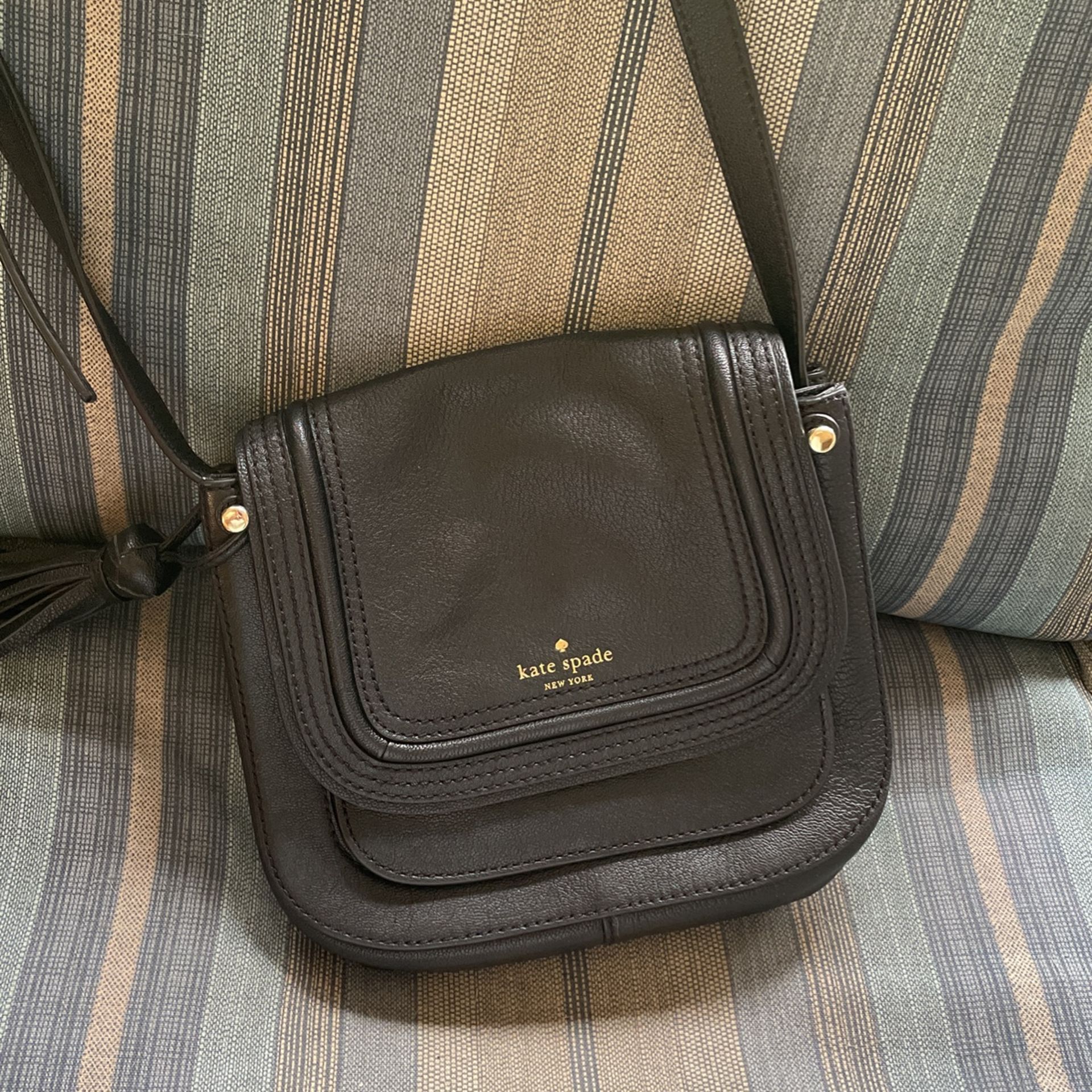 Kate Spade Pocketbook With A Long Adjustable Tassel Strap