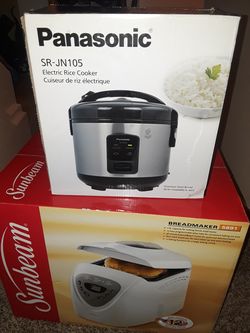 Electric rice cooker new & a bread maker used only once