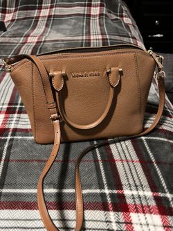 Michael Kors I have both in brown and black