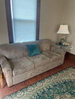 Sofa & Queen Pull Out Bed.